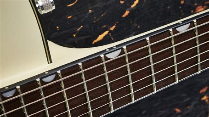 Are rosewood fretboards finished?