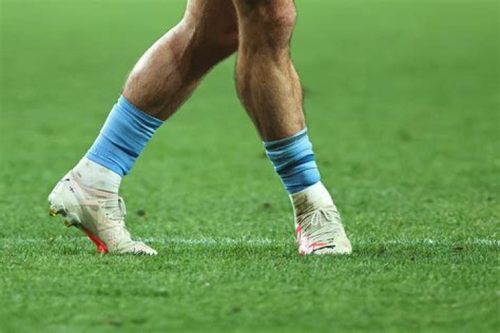 Do soccer players wear shin guards?