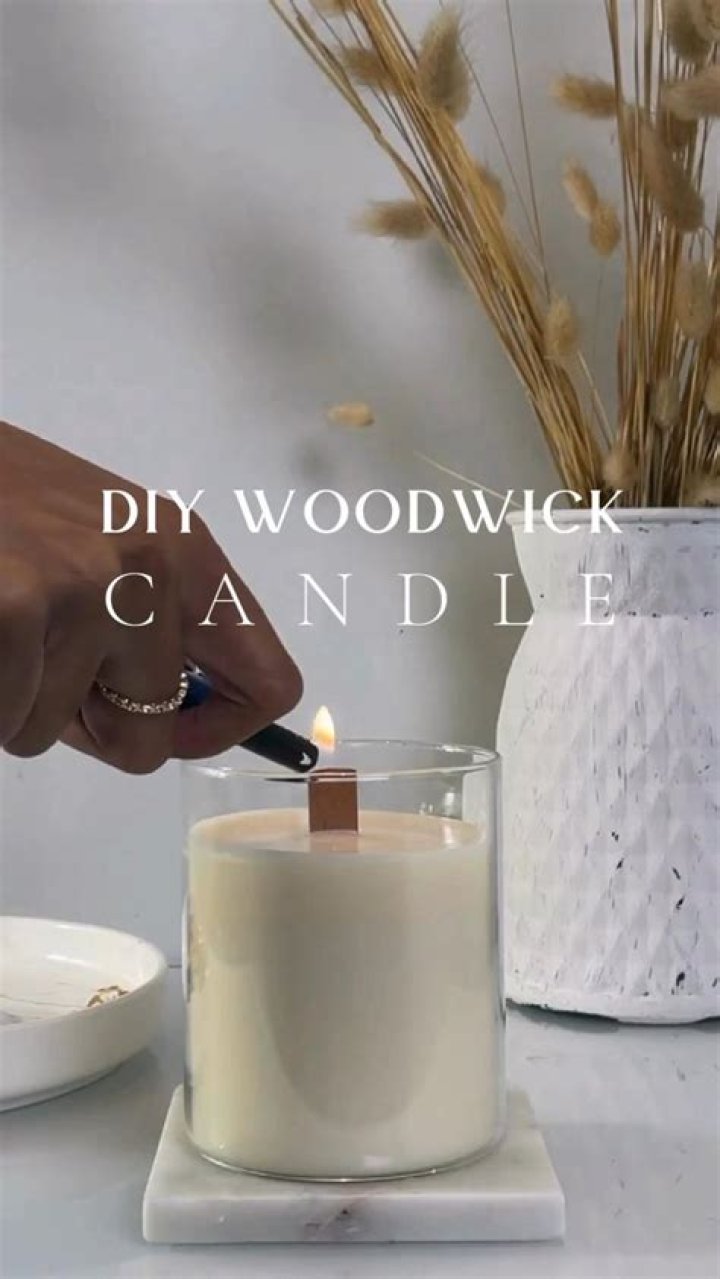 Do yankee candle own woodwick?