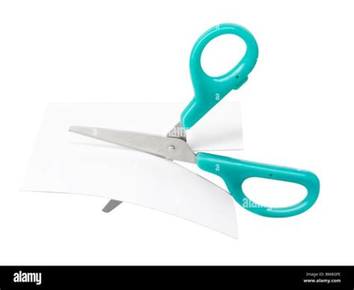 Does cutting paper dull scissors?