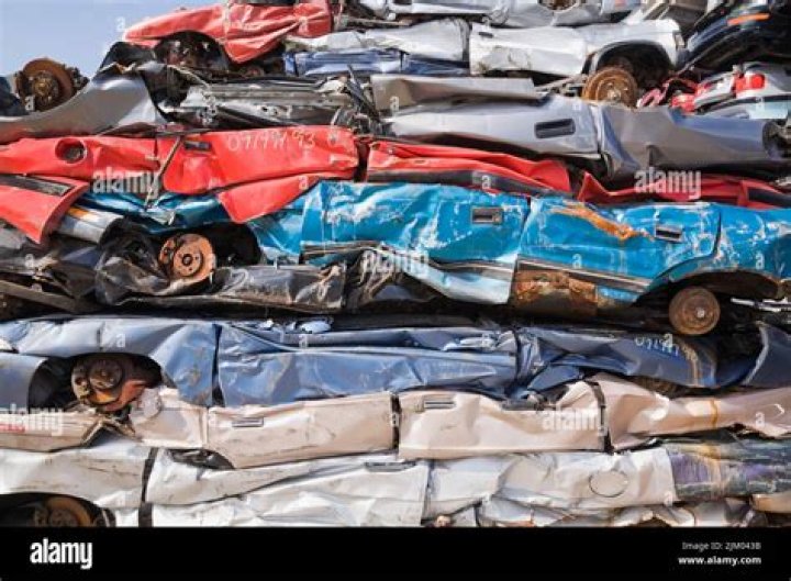 How are discarded automobiles typically recycled?