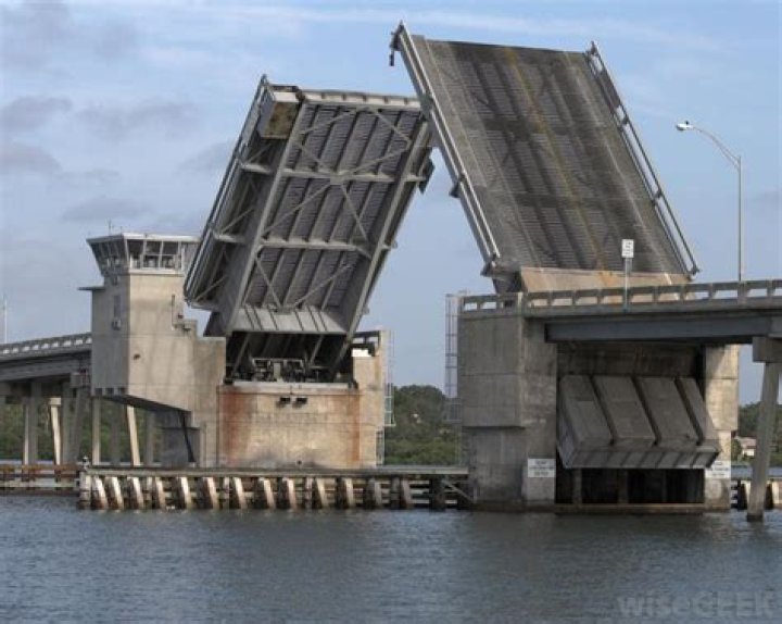 How does a bascule bridge operate?