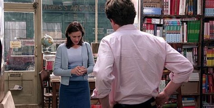 In just a girl standing in front of a boy?