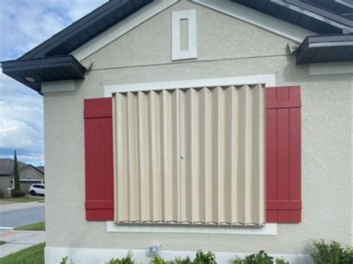 Should shutters be painted flat or gloss?