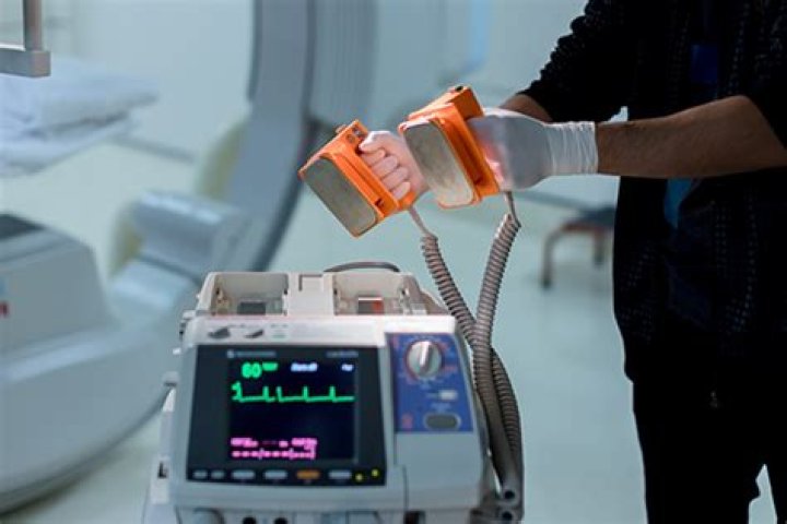 Should you defibrillate a patient who is in a moving vehicle?