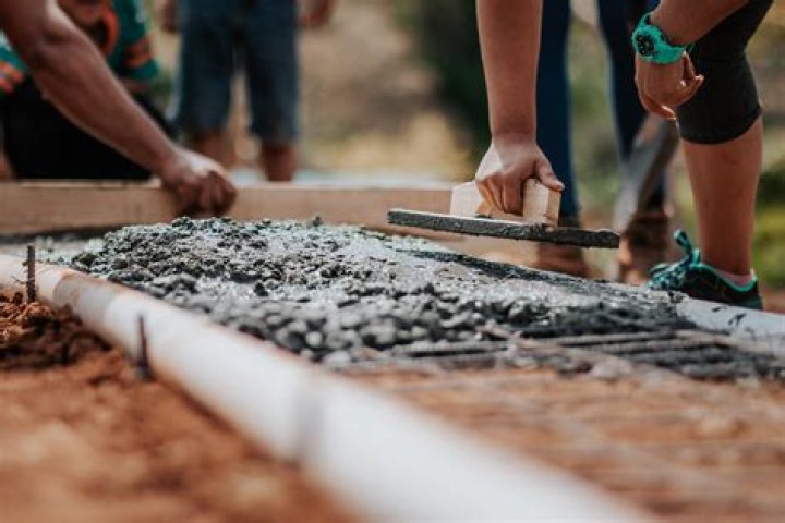 What do concrete finishers do?