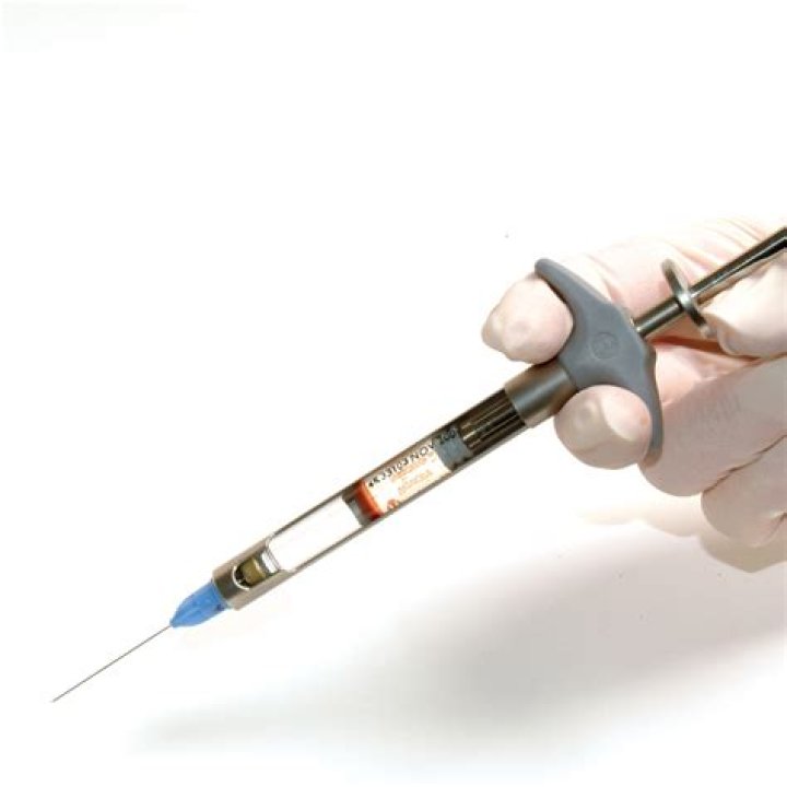 What does it mean to aspirate a syringe?