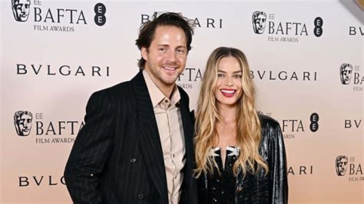 What does tom ackerley do for a living?
