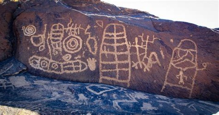 What is the difference between a petroglyph and a hieroglyph?