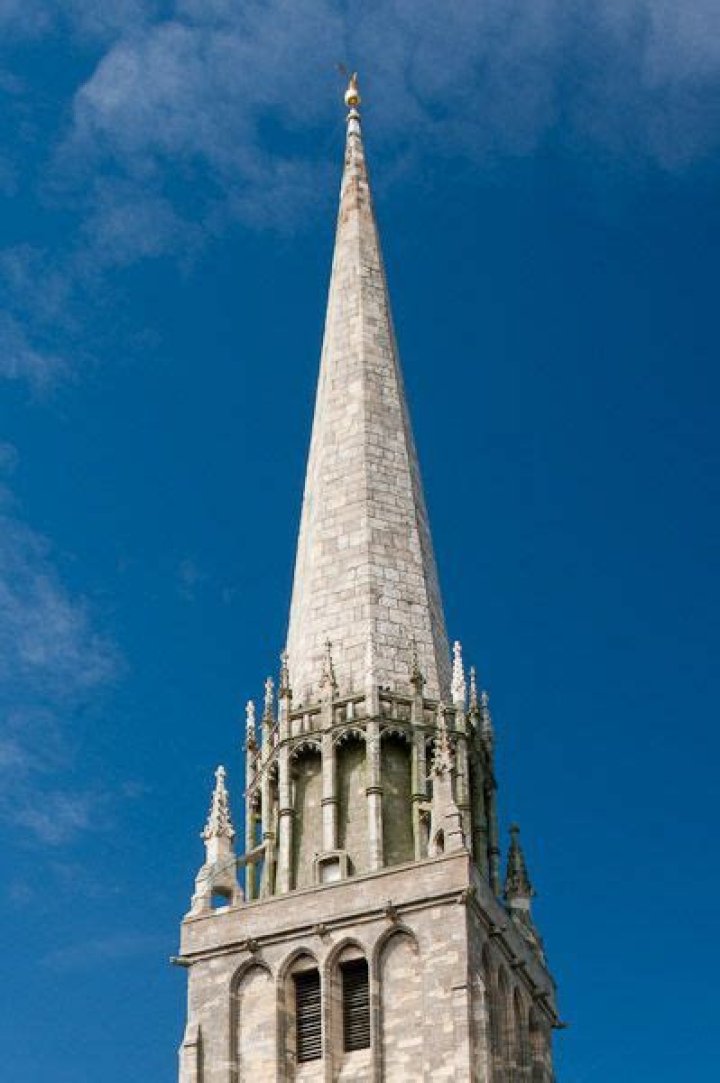 What is the difference between a spire and a steeple?