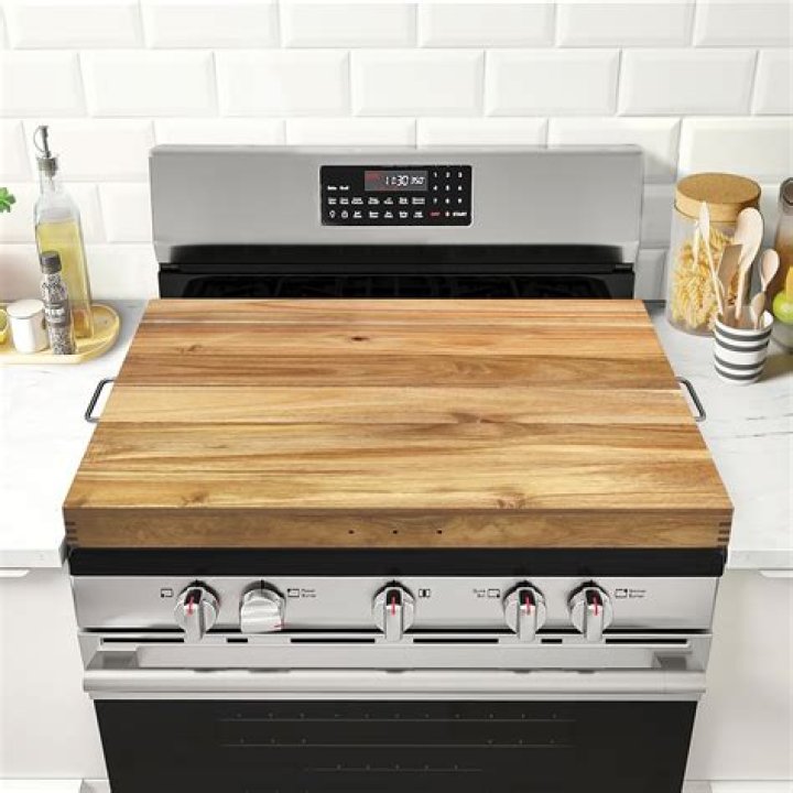 What is the point of a stove top cover?