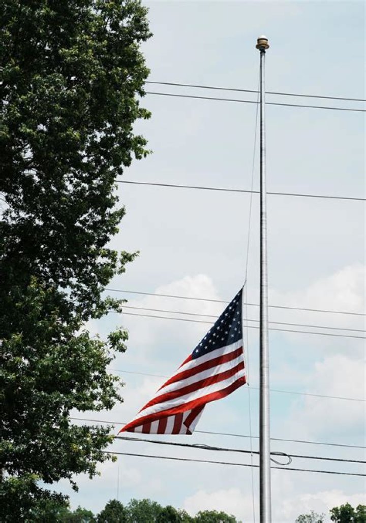 When are flags at half staff?