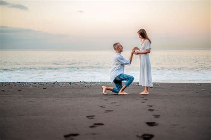 When proposing which knee goes down?