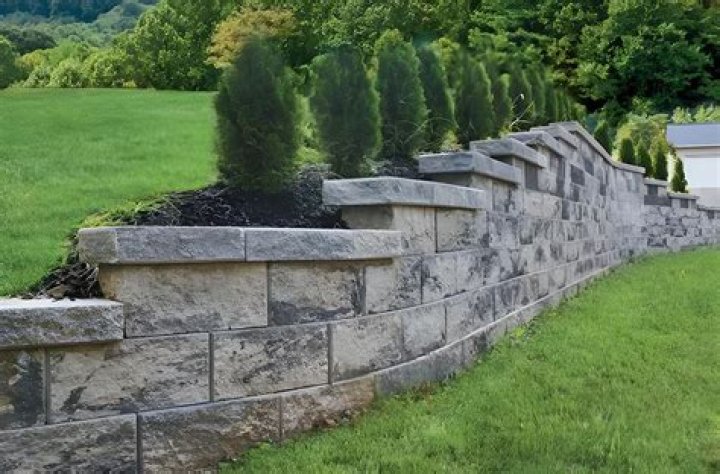 Where are cantilever retaining walls used?