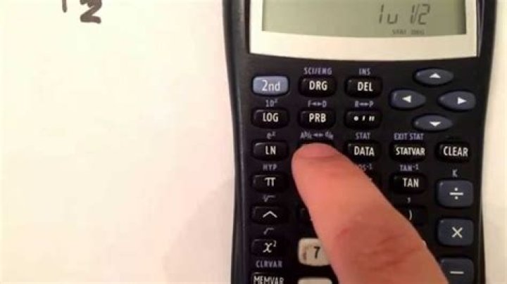 Where is the fraction button on a calculator?