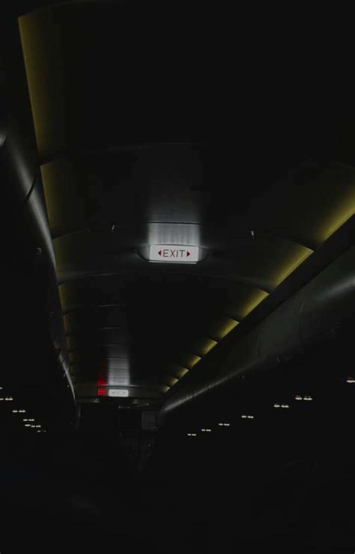 Why are cabin lights dimmed for takeoff and landing?