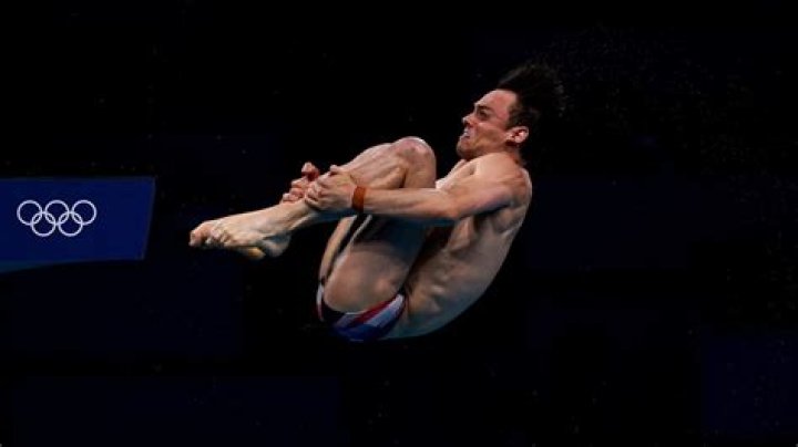 Why are some scores crossed out in diving?