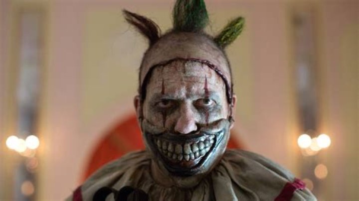 Why does twisty the clown wear a mask?