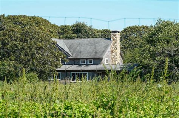 Why is belushi buried on martha's vineyard?
