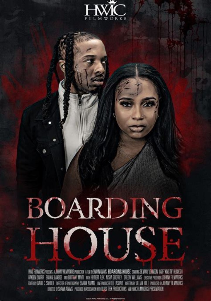 Why is billy drawn to the window of the boarding house?