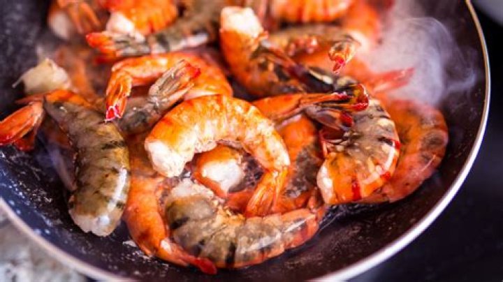 Why shrimp turn red when cooked?