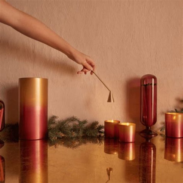 Why were candle snuffers invented?