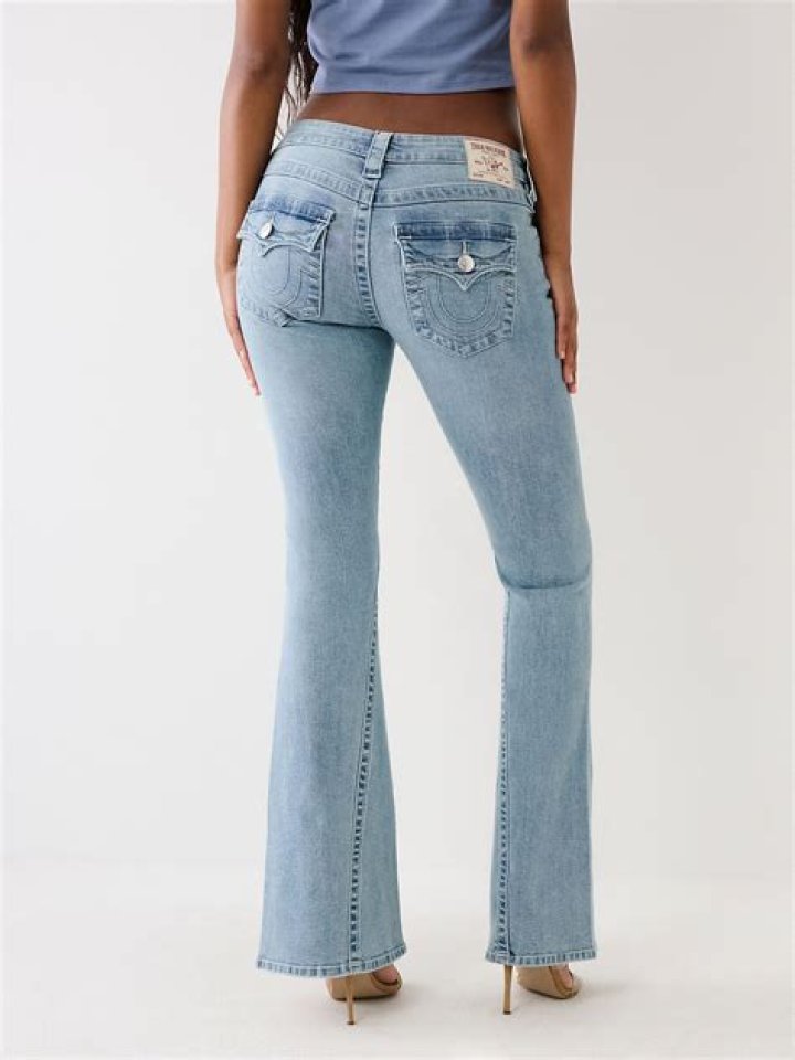 Why were low waisted jeans popular?