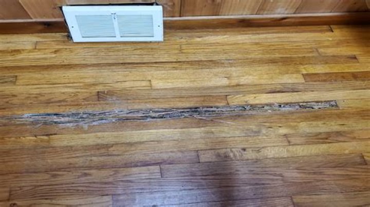 Will masking tape damage hardwood floors?
